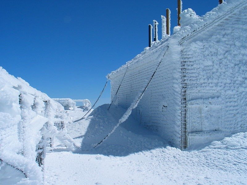 A frozen building chained down