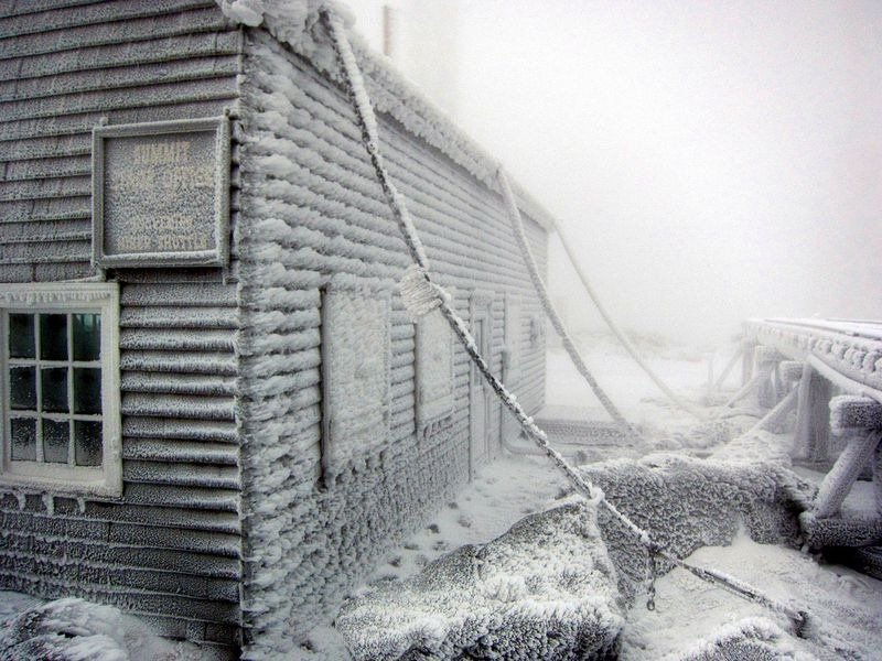 A building surrounded in frost chained to the ground